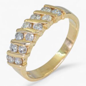 3855 Cintillo de oro amarillo de 14K con diamantes