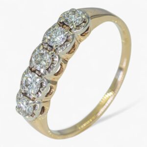 3860 Cintillo de oro amarillo de 14K con diamantes